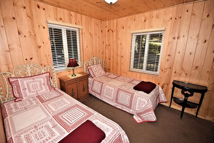 Bedroom 3: Two twin beds. This is near the front of the cabin. When you walk in the front door.