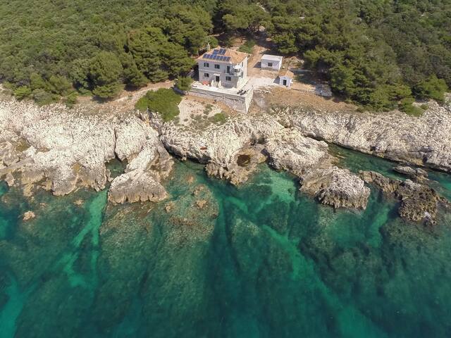 Beach front lighthouse Crna Punta
