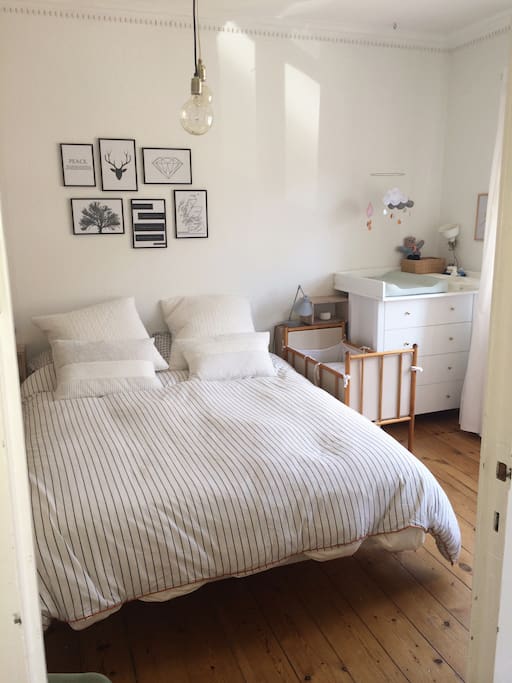 Main bedroom with double bed and baby crib if needed. Also a changing table for young kids.