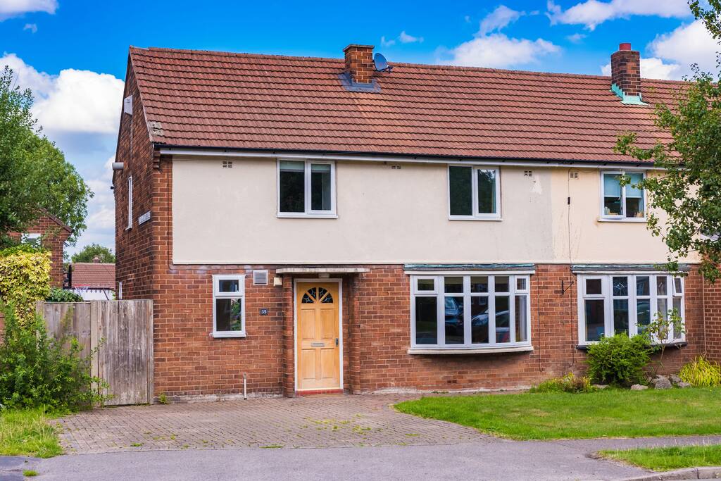 Outside, with double drive for off street parking with additional on street parking available