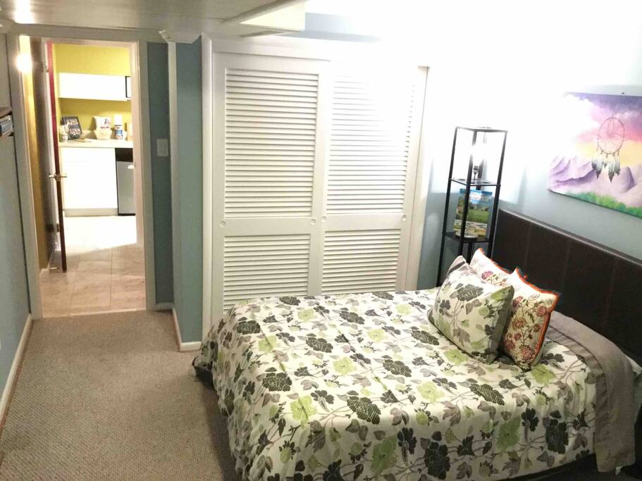 This shows the hallway from your room that leads to your private kitchenette with microwave, mini-fridge, sink, and plenty of counter space for preparing light meals.