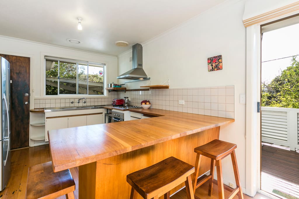 The kitchen with large fridge