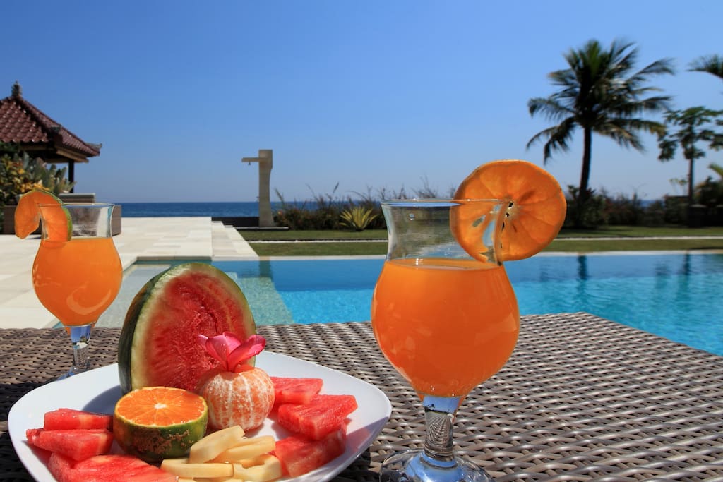 Enjoying a drink by the pool