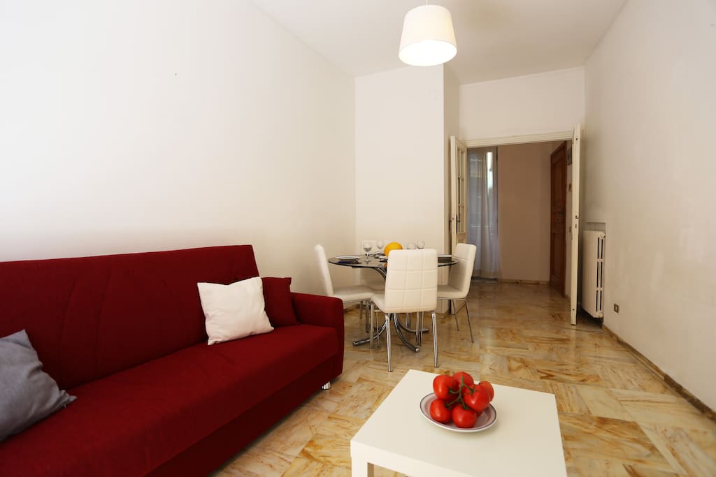 Living with dining area and sofa bed
