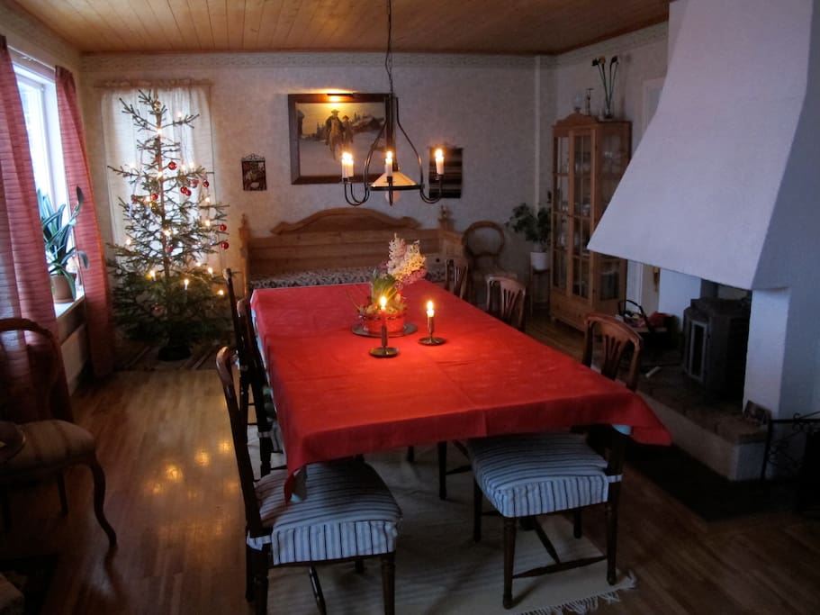 Big dining room/ sitting room with cozy log burner.