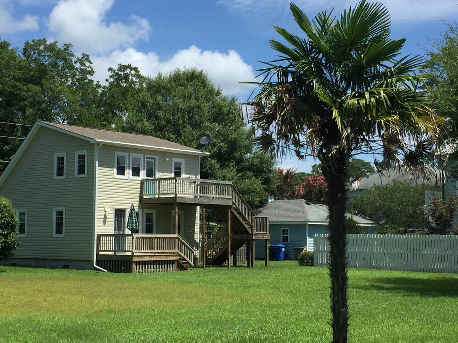 Large backyard - side yard is fenced for furry friends. Notice the decks on both levels for a view of the Neuse.