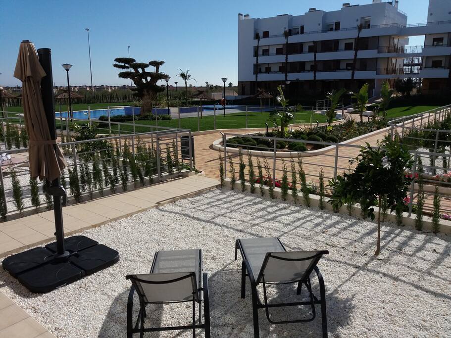 Tuin/terras met toegang tot pool area