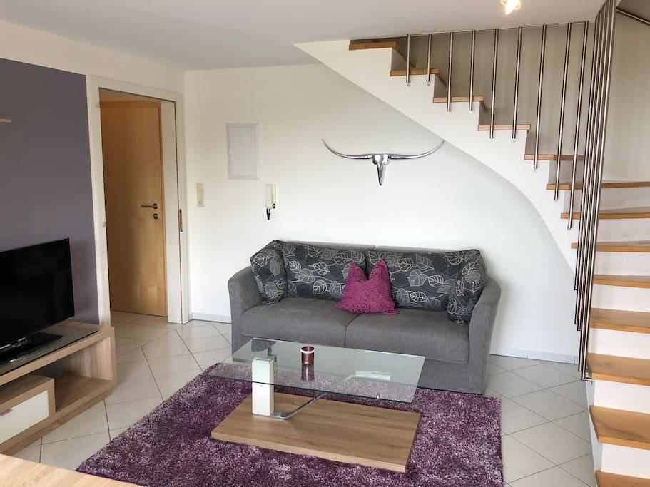 Wohnzimmer mit Ausziehcouch