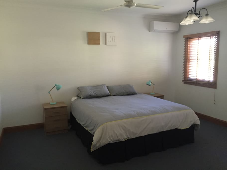 Master bedroom with king-size bed