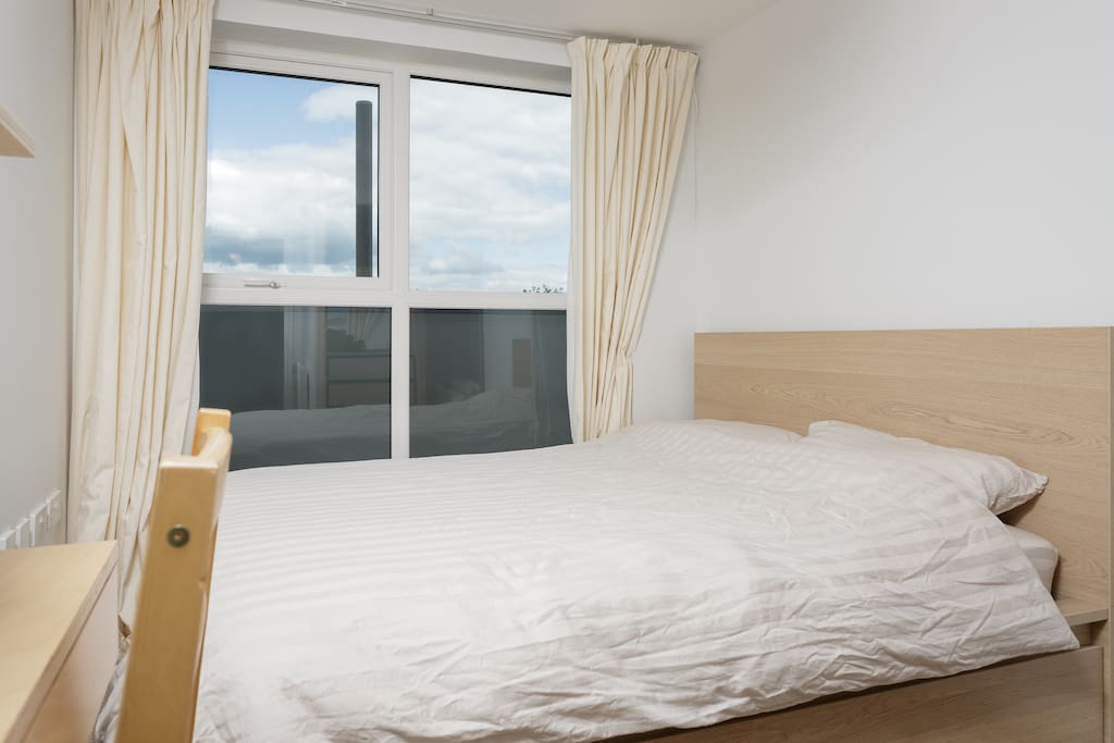 Bright, double bed.