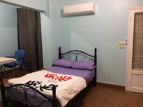 Big private bedroom with a balcony in Heliopolis