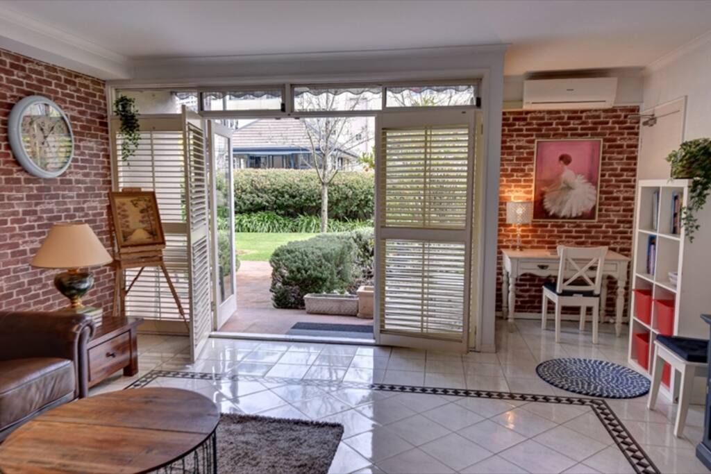 Living room facing central garden