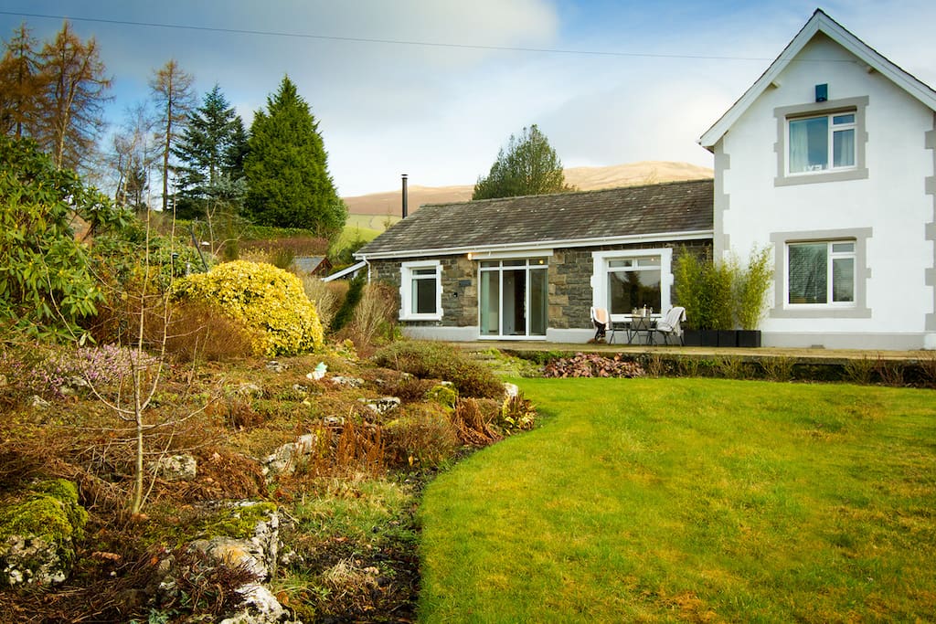 Old Station Cottage is set amongst beautiful large gardens.