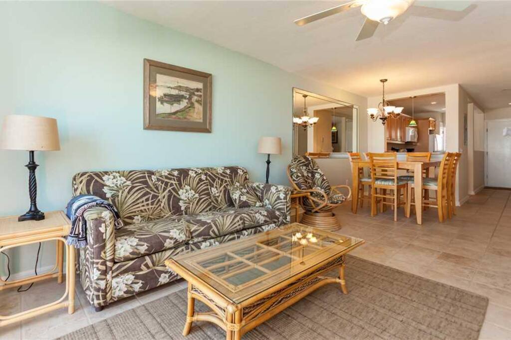 Relax in our "beach chic" living room - Sit down on the couch and you'll have ocean views to your right and our huge HDTV directl