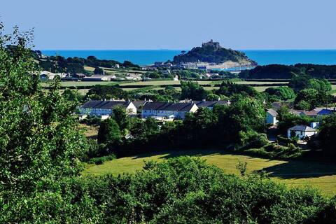 5 Beds sleeps 8. Rural with spectacular sea view.