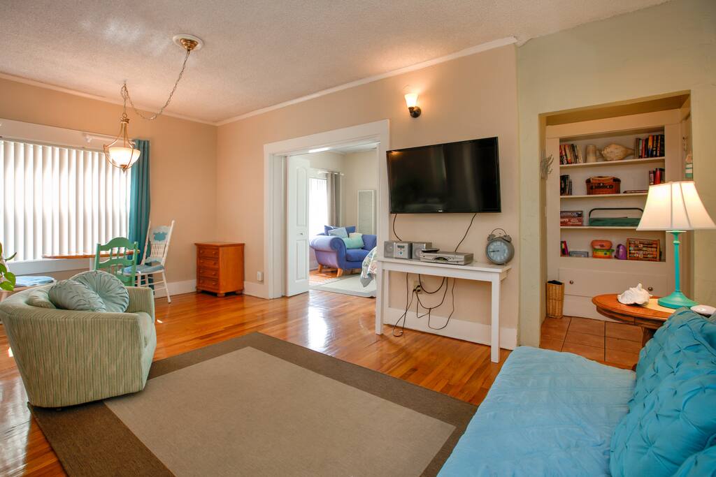 Polished hardwood floors feature throughout.
