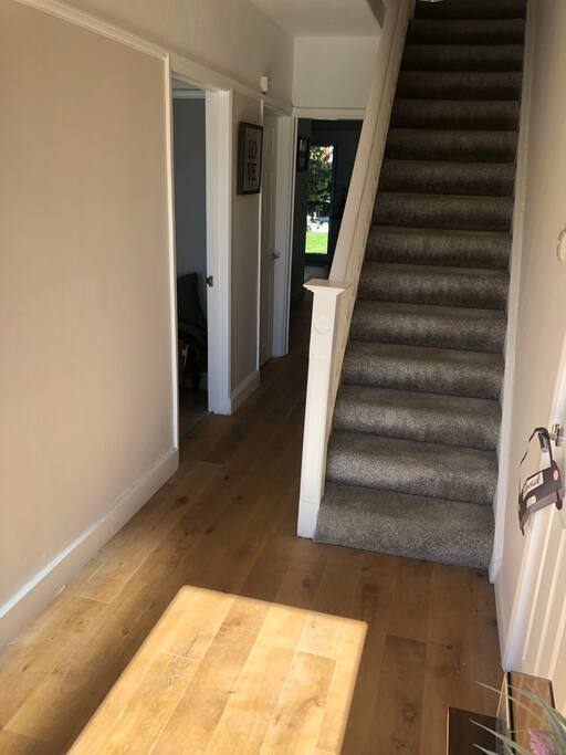 Hallway, study to the right, living room and kitchen entrance