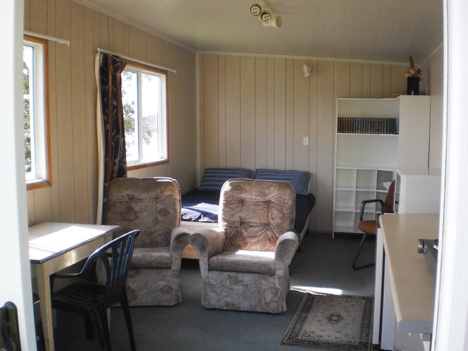 Inside - bed, couches, dining