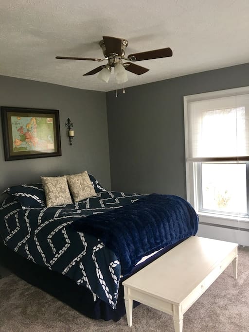 Master bedroom with queen sized bed.