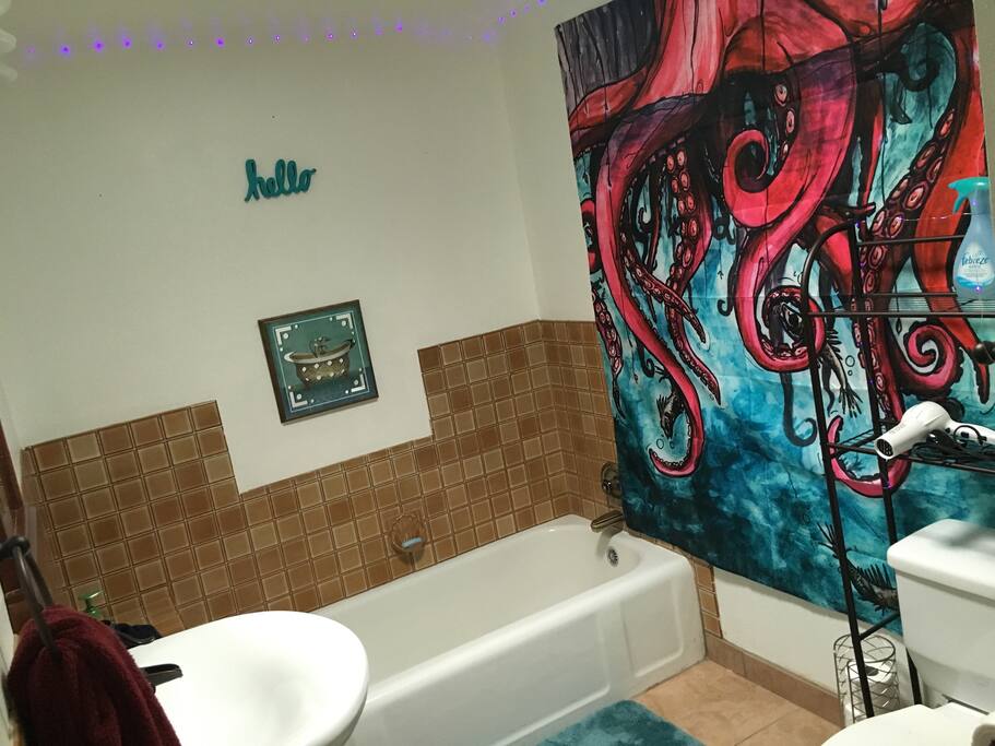 This is a shared bathroom with one other room. (There's a sneaky shower hidden behind the door - It also has a disco setting! Omg!)