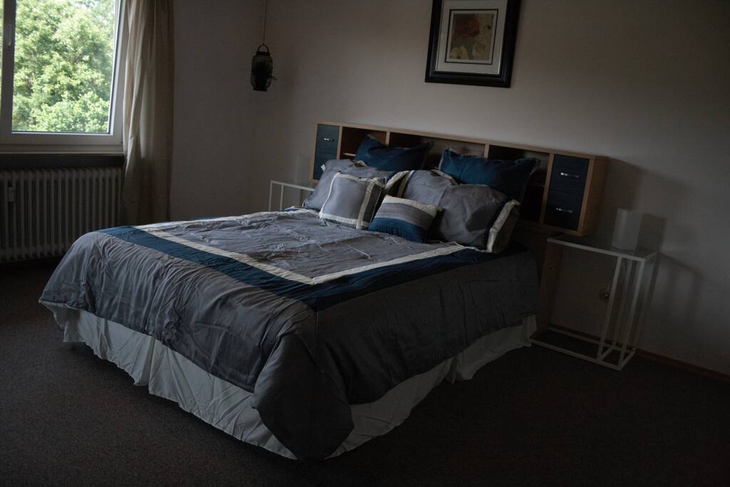 Master bedroom with queen-sized bed