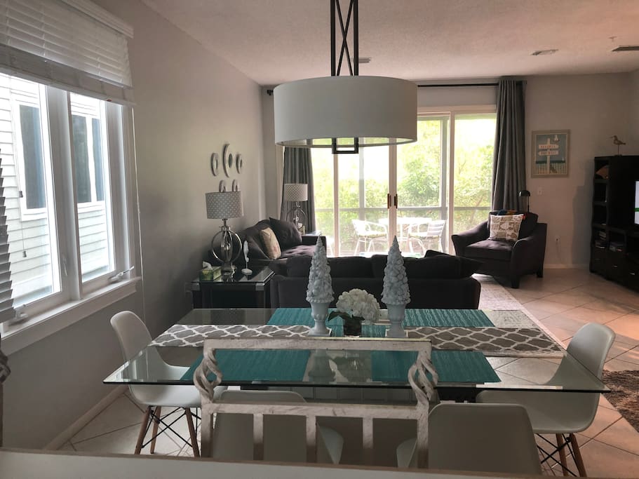 Living/dining area. Lots of light. Screened in porch off living room.