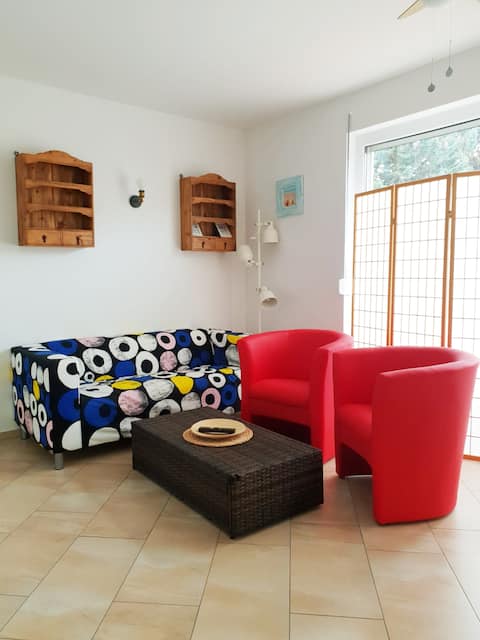 Erfolgreiche Airbnb-Immobilie: Modern apartment near the windmill 2 (terrace, sauna) in Koserow