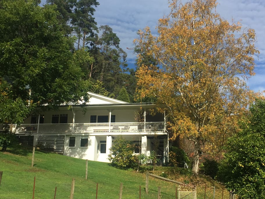 Side view of 102 year old guest house with the three Apartments running along the front bottom storey.