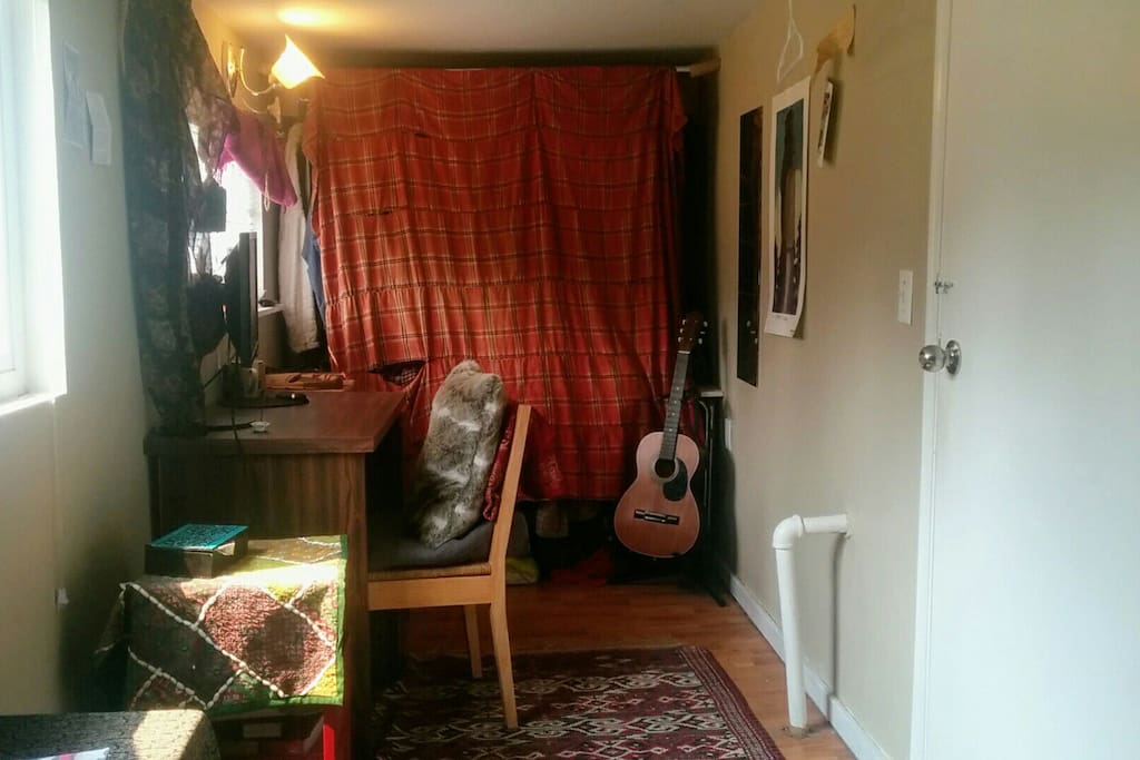 Small but bright, cozy, and a bit orientally decorated. The curtain covering the closest is hand-woven by my grandma some 70 years ago, ... take care of it please :)