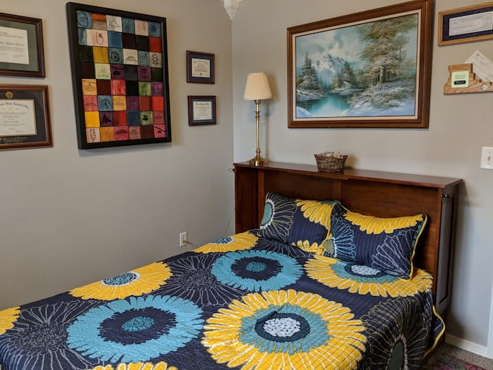 Private bedroom with queen size bed, fresh linens, closet with dresser and window to back yard