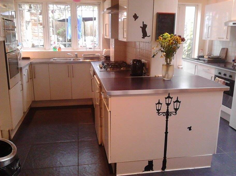 Two kitchens, three ovens.