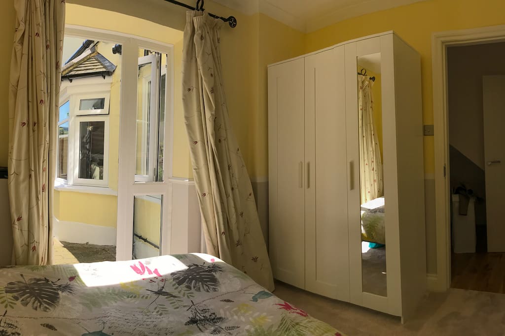Bedroom with own door to garden