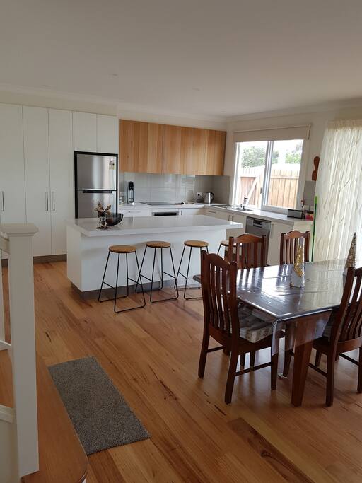 An open plan kitcken, dining ang lounge.