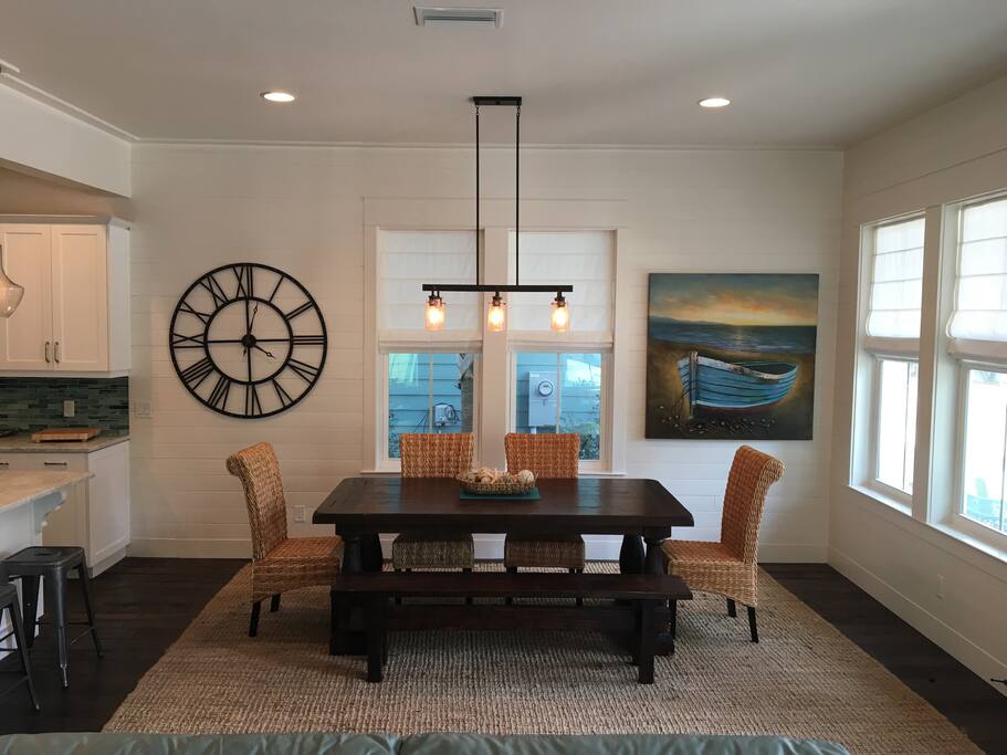 Large dining area with bar seating at kitchen
