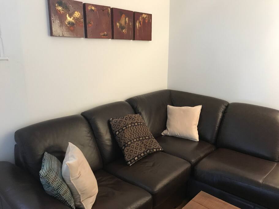 Large comfortable living room with large sectional sofa