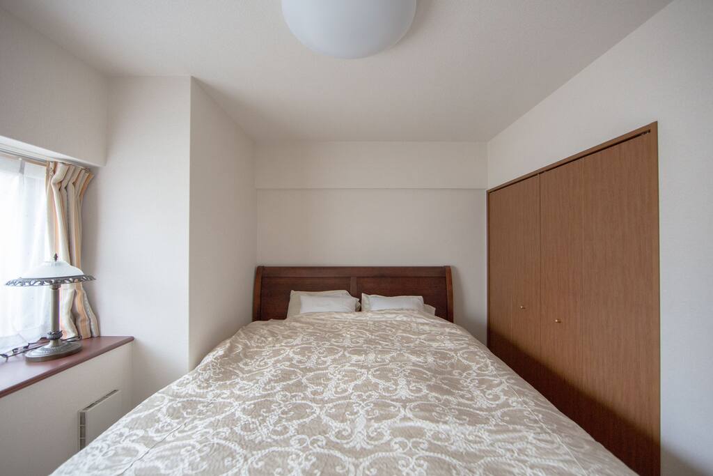 1st bedroom with a California King size bed.