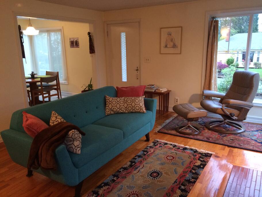 Living room with big corner windows.