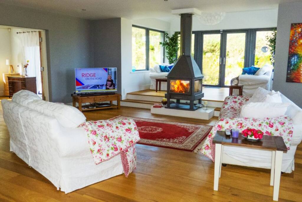 Sitting room & Sun room c/w Stove