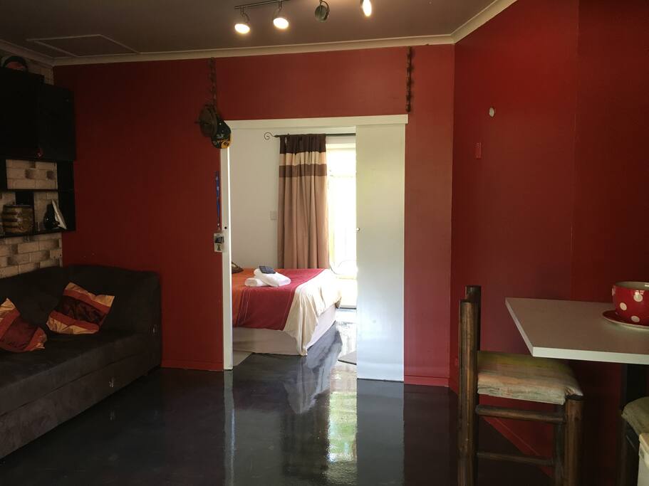 Living area, looking through to bedroom