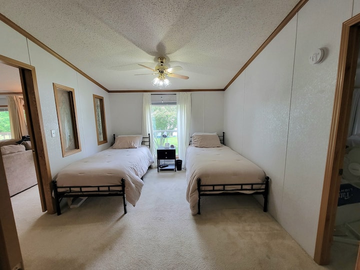 Our walk through den with 2 twin XL beds serves as the 4th bedroom