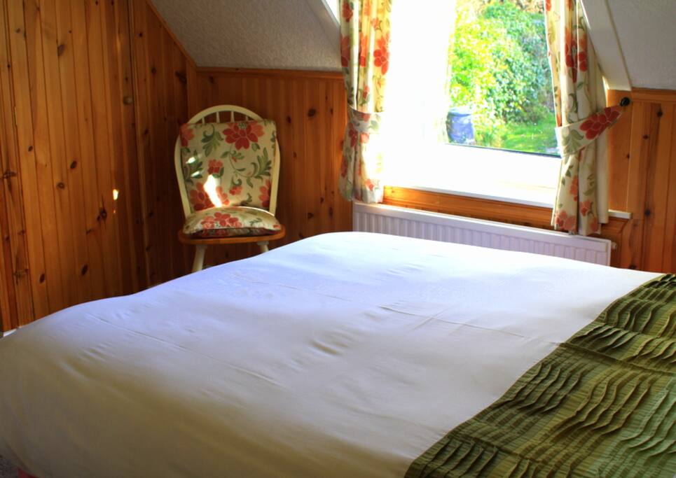 Double en-suite room with garden view.