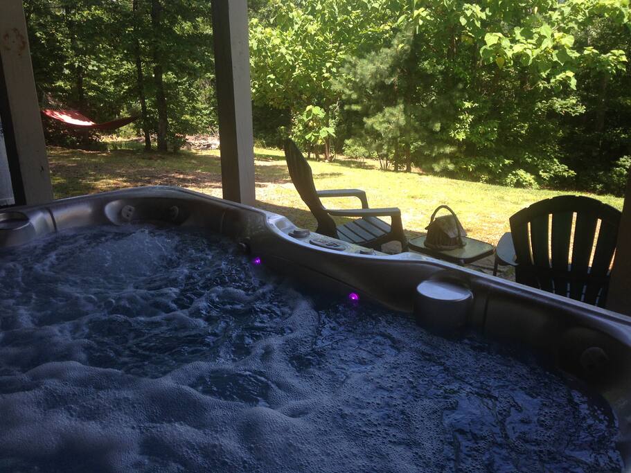 Hot tub with outdoor sitting area