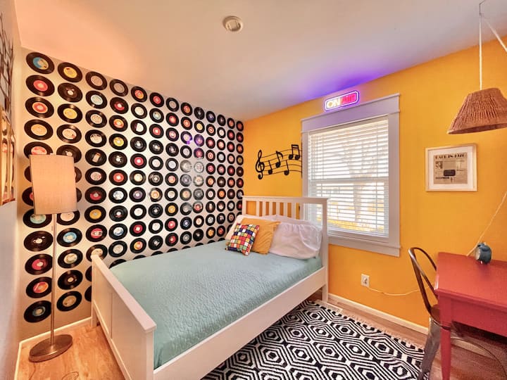 The 70’s record room! Enjoy looking through hundreds of salvaged records. Vanity/desk/mirror also in this room.
