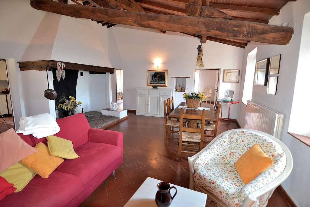 The Living Room with Big Tuscan Fireplace