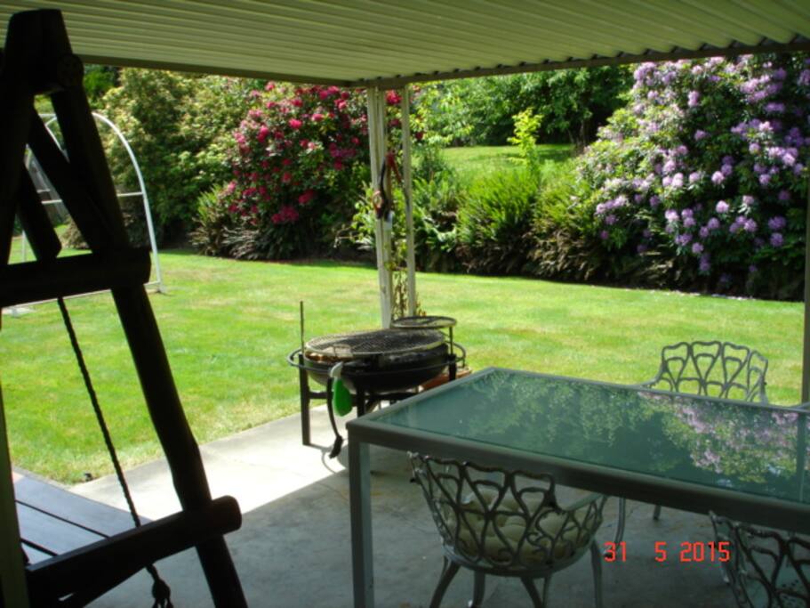 Patio with full BBQ facilities and a Cowboy charcoal grill.