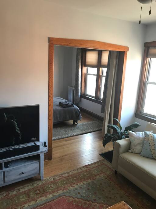 Doorway to your room with a heavy curtain to separate the family room from guest bedroom.