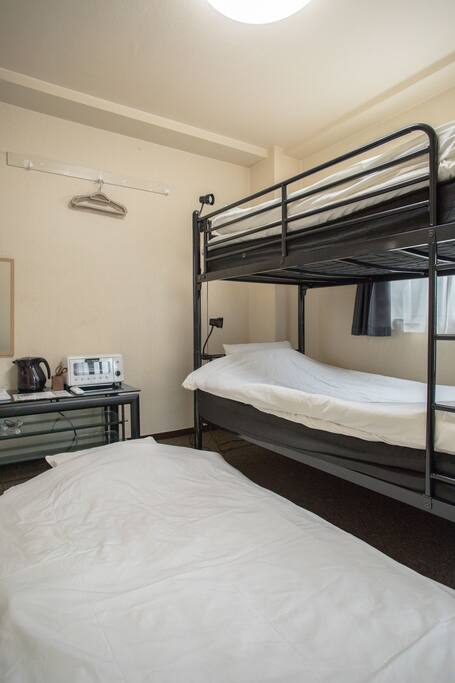 Bunk bed and 1 single size futon .