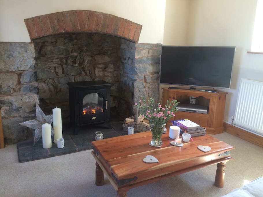 Ingelenook fireplace, which forms an impressive centrepiece in the lounge.