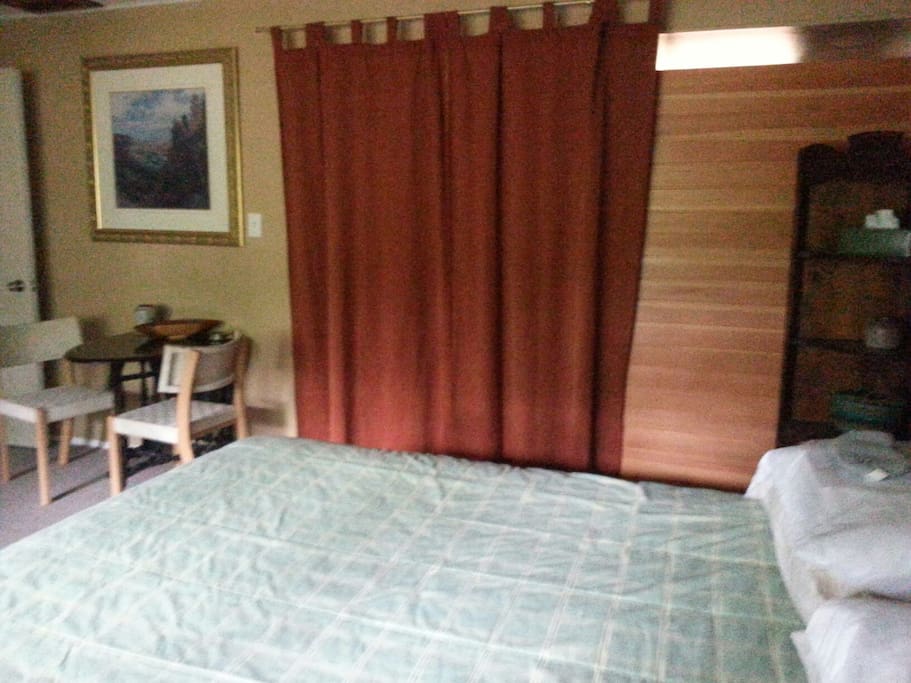 Curtains can be drawn to allow for privacy and/or darkness for either side.