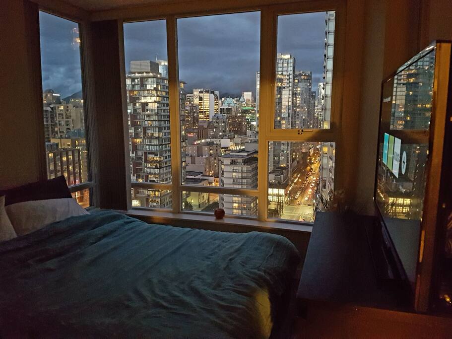 Kick back and relax in your spacious room with a comfy queen-size bed and your own TV